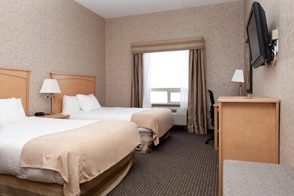 Paradise Inn And Suites Valleyview Habitación foto